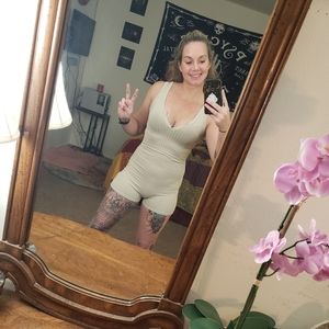 One piece short set by Shein and over sweater by Haute Project